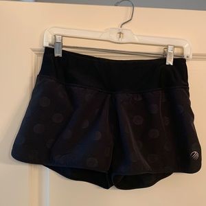 MPG black polka dot athletic shorts with liner.